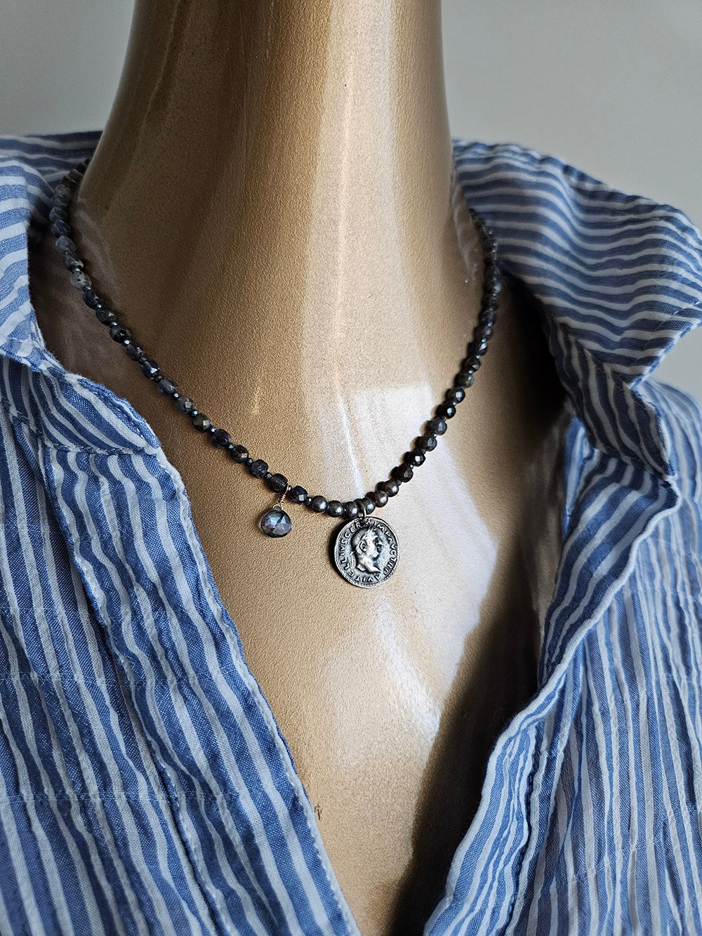 Handcrafted iolite necklace with vintage coin, pearls, and mystic topaz